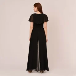 Adrianna Papell Jersey Jumpsuit With Chiffon Capelet And Skirt Overlay In Black 10 Adrianna Papell Jersey Jumpsuit With Chiffon Capelet And Skirt Overlay In Black -Glam Mirth Sales AP1D104868 AA002 Regular Back