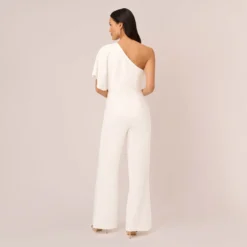 Adrianna Papell Flutter One Shoulder Jumpsuit In Ivory 9 Adrianna Papell Flutter One Shoulder Jumpsuit In Ivory -Glam Mirth Sales AP1E201788 AA194 Regular Back