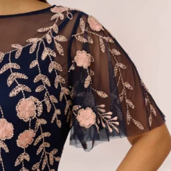 Adrianna Papell Plus Size Floral Beaded Dress With Sheer Flutter Sleeves In Navy Blush 10 Adrianna Papell Plus Size Floral Beaded Dress With Sheer Flutter Sleeves In Navy Blush -Glam Mirth Sales AP1E205858 AX412 Plus Lifestyle