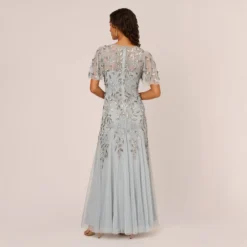 Adrianna Papell Long Floral Beaded Gown With Flutter Sleeves In Blue Heather 9 Adrianna Papell Long Floral Beaded Gown With Flutter Sleeves In Blue Heather -Glam Mirth Sales AP1E208445 AA469 Regular Back c9d0d51f e45d 40de 9768 104ae7b9a220