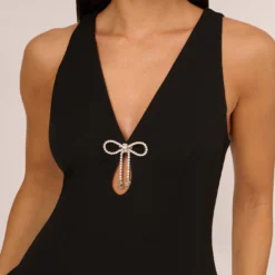 Sleeveless Crepe Mini Dress With Rhinestone Bow Accent In Black 9 Sleeveless Crepe Mini Dress With Rhinestone Bow Accent In Black -Glam Mirth Sales MN1E208600 AA002 Regular Detail